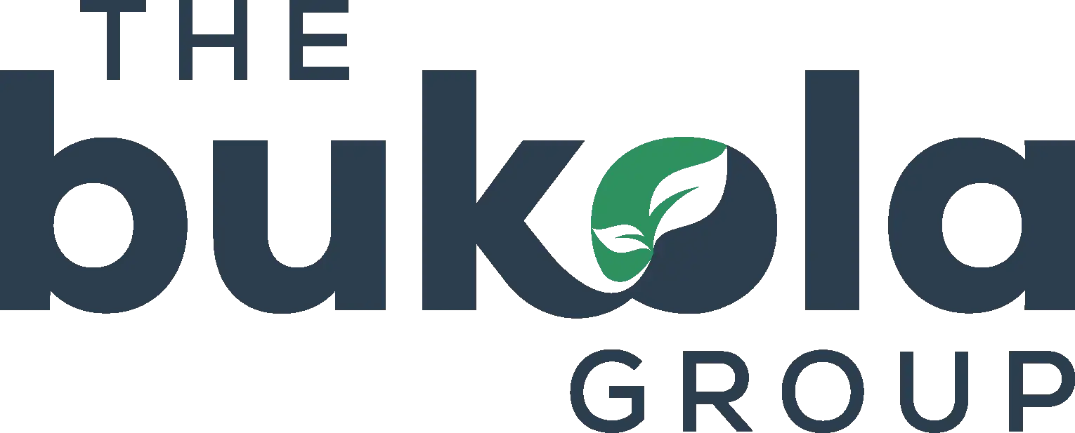 The Bukola Group Logo Dark Blue Text with Green Leaf in the Letter O