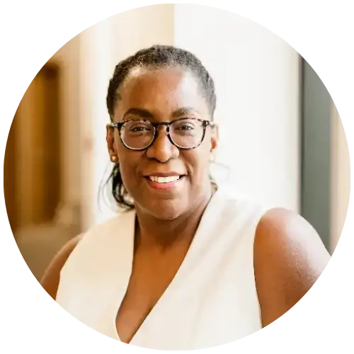 Bukola Odofin HR Recruitment Expert Smiling In Cream Outfit Sitting By Window